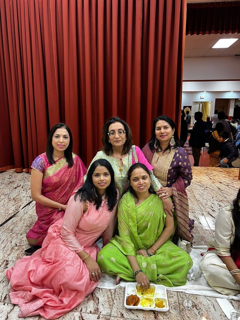 Women seated together at Preeti Bhoj