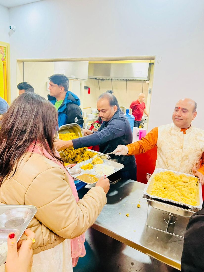 Serving food from the BAJCCA kitchen